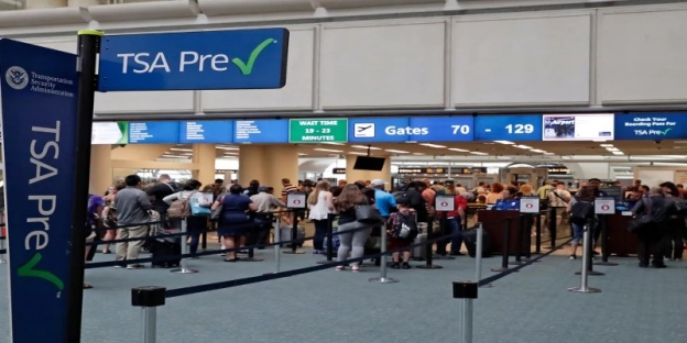 A group of people standing in line AI-generated content may be incorrect.