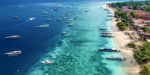 A group of boats in the water AI-generated content may be incorrect.